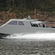 Illustration for article titled This Is the Navy SEAL's Shadowy New Multi-Mission Stealth Speedboat